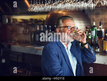 Senior Man Hangout Drinking Alcohol Night Club Concept Stock Photo