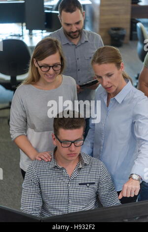 startup business people group working as team to find  solution Stock Photo