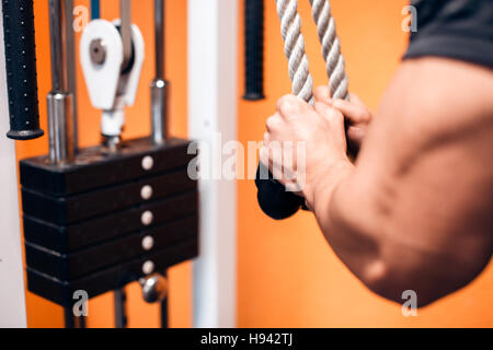 Young Bodybuilder Doing Exercise For Triceps Stock Photo