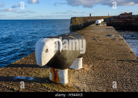 Sheep shaped bollards / cleats at Corrie harbour, Isle of Arran, North Ayrshire, Scotland Stock Photo