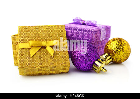 Christmas gift boxes and decorations isolated on white background Stock Photo