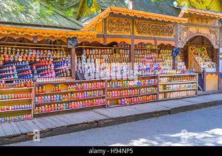 The carved stalls with wide range of traditional wooden painted matryoshka dolls, the world known symbol of the country Stock Photo