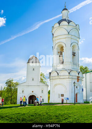 The tall white bell tower of St George the Vicorious and the Water Tower in Kolomenskoye Manor Stock Photo