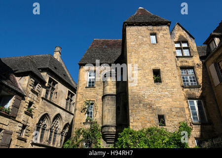 Some of the many historic buildings in the town of Sarlat (Sarlat-la-Caneda) in the Dordogne in France Stock Photo