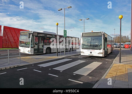 Airport staff shuttle buses wait for passengers at London's Gatwick Airport, UK Stock Photo