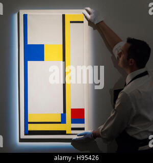 London, UK. 18th Nov, 2016. A technician views 'Composition Yellow, Blue, Black, Red and White' by Marlow Moss (est. GBP60-80k), at the preview at Sotheby's of works on view at four upcoming November auctions featuring Modern & Post-War British Art, A Painter's Paradise (Julian Trevelyan & Mary Fedden at Durham Wharf), Scottish Art and Picasso Ceramics from the Lord & Lady Attenborough Private Collection. Credit:  Stephen Chung/Alamy Live News Stock Photo