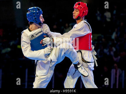 Burnaby, Canada. 18 November, 2016. WTF World Taekwondo Junior Championships Hakan Recber (TUR) and Omar Lakehal (MAR) red compete in the final of male 59kg won by Recber Alamy Live News/ Peter Llewellyn Stock Photo