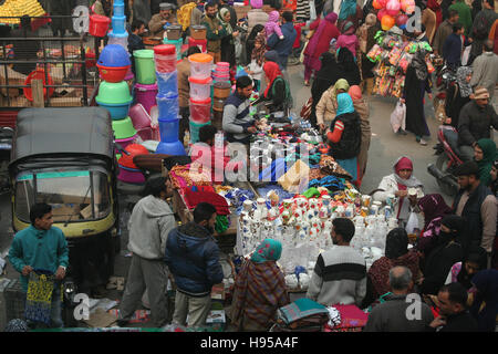 Srinagar, Indian Administered Kashmir19 November.kashmiri shoppers and commuters pass through Lal Chowk, the main market in central Srinagar, Markets across opened for the first time since the unrest, which left nearly 100 persons dead, started a day after Hizbul Mujahideen commander Burhan Wani was killed in a gunfight with security forces on July 8. separatist leaders called for businesses to open for two days. Credit:  Sofi Suhail/Alamy Live News Stock Photo