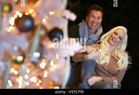 Cologne, Germany. 18th Nov, 2016. TV star Daniela Katzenberger and her husband Lucas Cordalis sit next to a Christmas tree in Cologne, Germany, 18 November 2016. Photo: OLIVER BERG/dpa/Alamy Live News Stock Photo