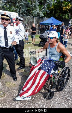 Miami Beach Florida,Veterans Day,celebration activities,disabled,wounded veteran,wheelchair,visitors travel traveling tour tourist tourism landmark la Stock Photo