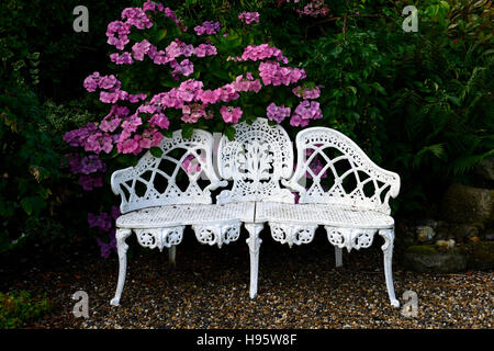 White wrought iron lutyens bench seat seating pink 