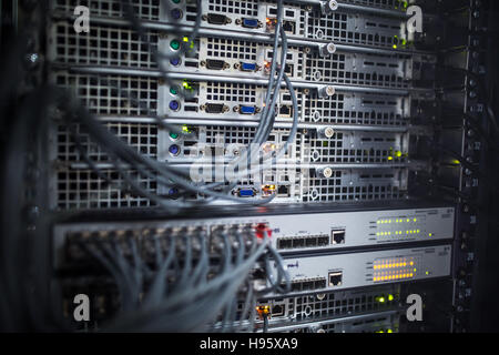 Server rack cluster in a data center (shallow DOF; color toned image) Stock Photo