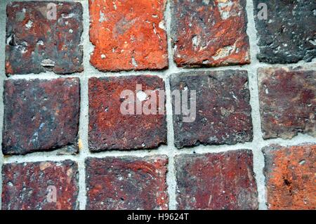 Rows of old red brick used as pavement Stock Photo