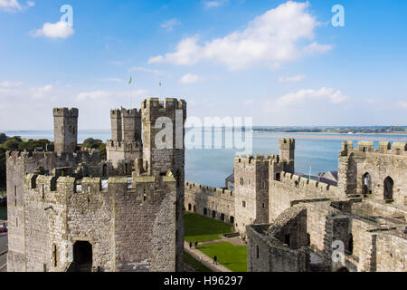 View to Menai Strait and Anglesey from inside Caernarfon Castle walls. Caernarfon, Gwynedd, North Wales, UK, Britain Stock Photo