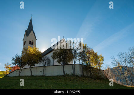 Autumn morning at the church in Sankt Oswald, Tyrol, Austria. Stock Photo