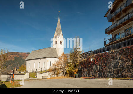 Autumn morning at the church in Sankt Oswald, Tyrol, Austria. Stock Photo