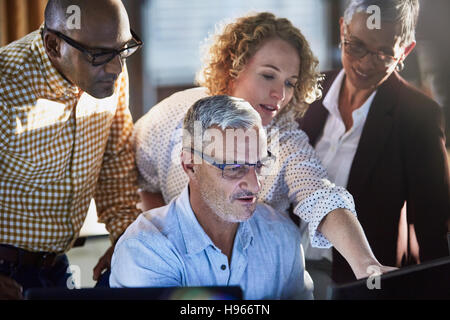 Business people working at computer Stock Photo