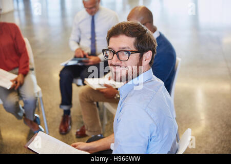 Portrait confident businessman in meeting Stock Photo