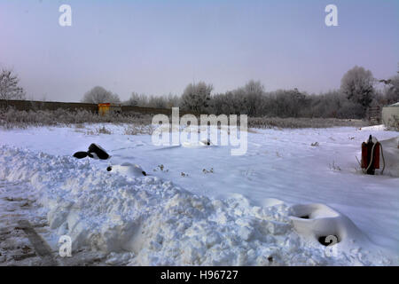 The first snow fell that cleared grader Stock Photo