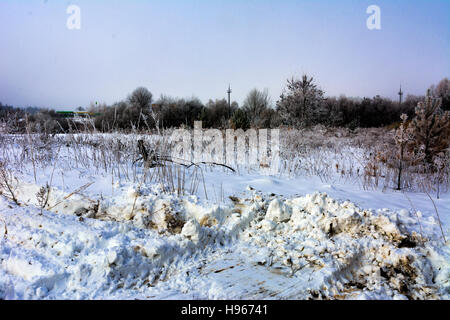 The first snow fell that cleared grader Stock Photo