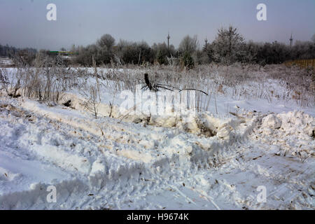 The first snow fell that cleared grader Stock Photo