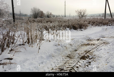 The first snow fell that cleared grader Stock Photo