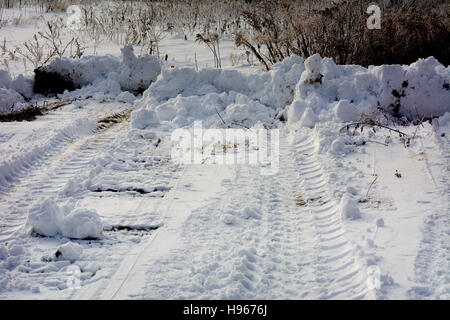 The first snow fell that cleared grader Stock Photo