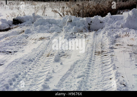 The first snow fell that cleared grader Stock Photo