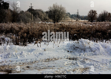 The first snow fell that cleared grader Stock Photo