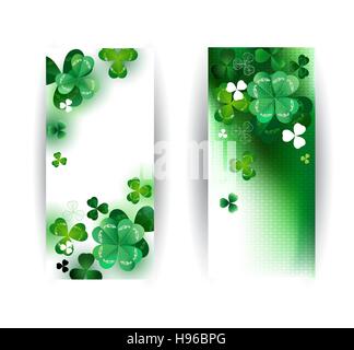 two banners with green clover with four leaf on a green background. Stock Vector
