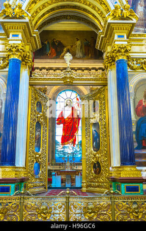 The altar of St Isaac's Cathedral decorated with the stained-glass window, depicting Jesus Christ, blessing the worshipers Stock Photo