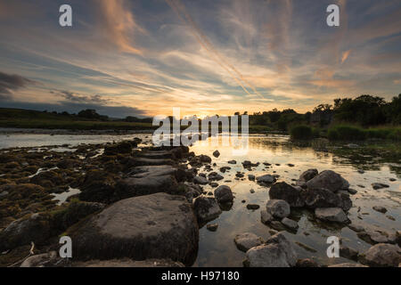 View of stepping stones across River Wharfe to Linton Church, Linton Falls, Wharfedale, Yorkshire Dales, UK Stock Photo