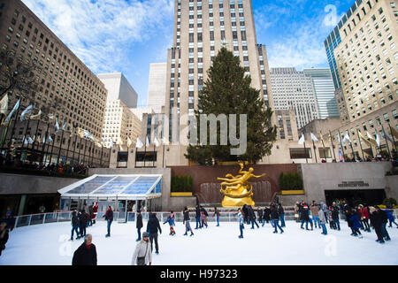 View from Rockefeller Center in Manhattan during the Christmas holiday season with skaters and Christmas tree. Stock Photo