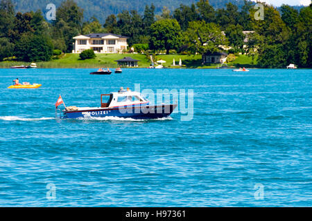 Klagenfurt, Austria - August 14 2016: Police boat patrolling the waters of lake Worthersee in Carinthia, Austria Stock Photo