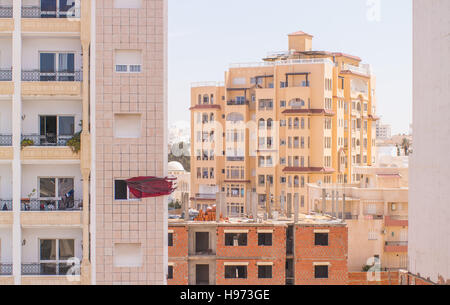 Curtains blowing in the wind outside the window Stock Photo