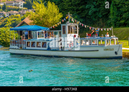 Maria Worth, Austria - August 14 2016: Vintage tourist boat Lorelei at pier waiting for tourists to board on nostalgic boat ride on Worthersee Stock Photo