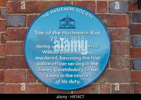 Blue plaque on site of the 1855 Haslemere Riot, High Street, Haslemere, Surrey, England, United Kingdom Stock Photo