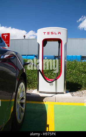 ZURICH - July 30:  Tesla Supercharger station on July 30, 2016 in Zurich, Switzerland. Tesla motors develops network of the charging stations across E Stock Photo