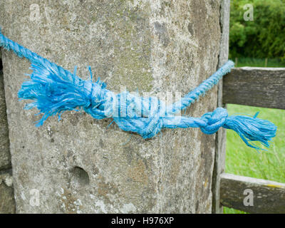 Knot in blue Nylon Rope Stock Photo
