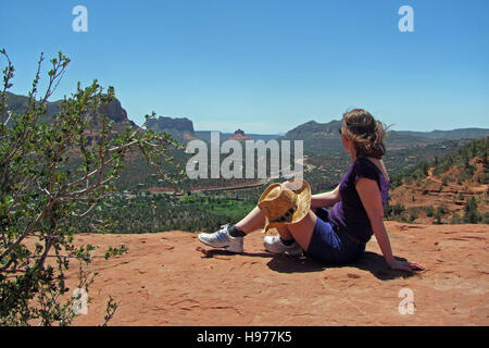 Woman at a vortex in Sedona, Arizona Stock Photo