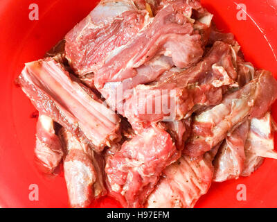 Raw Deer Meat or Venison ribs marinated with special and selected spice. Stock Photo