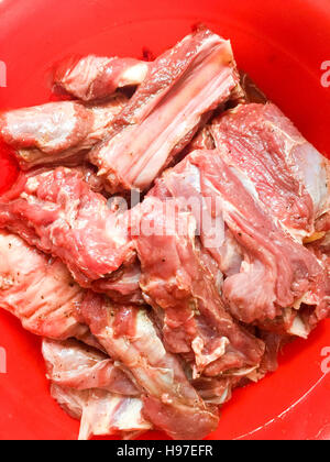 Raw Deer Meat or Venison ribs marinated with special and selected spice. Stock Photo