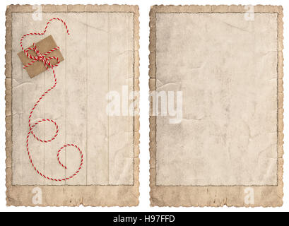 Vintage style christmas card. Frame for photos and pictures for your images. Used paper with edges isolated on white background Stock Photo