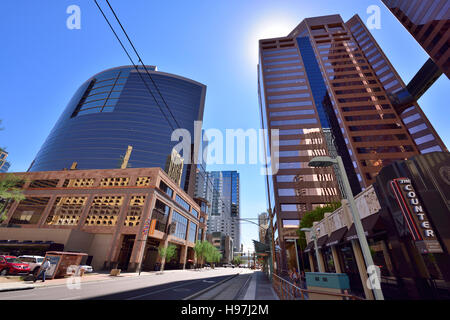 Downtown Phoenix Arizona with Renaissance Phoenix Downtown Hotel, Phelps Dodge Tower and other buildings, tracks of light rail Metro tram Stock Photo