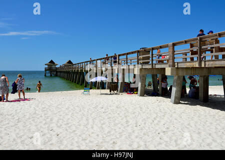 Sandy beach and pier, Naples, Florida, USA Stock Photo