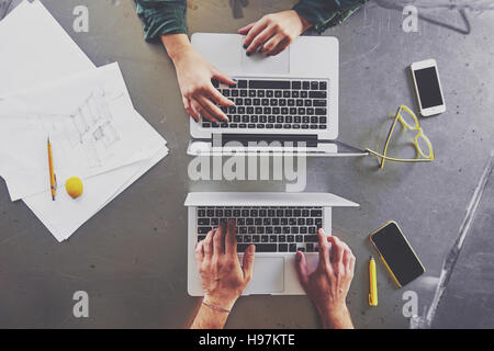 Top view of architects working at computer in office Stock Photo