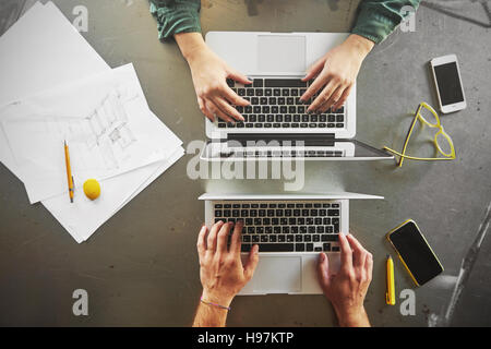 Top view of architects working at computer in office Stock Photo