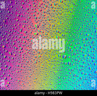 abstract background with water drops on multicolored surface Stock Photo