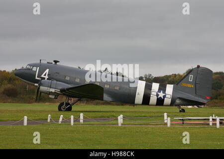 Douglas C-47A Skytrain, military version of the DC-3 Dakota,in USAAF D-Day markings parked at White Waltham Stock Photo