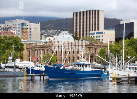 The view of marina boats with Hobart downtown buildings behind (Tasmania). Stock Photo